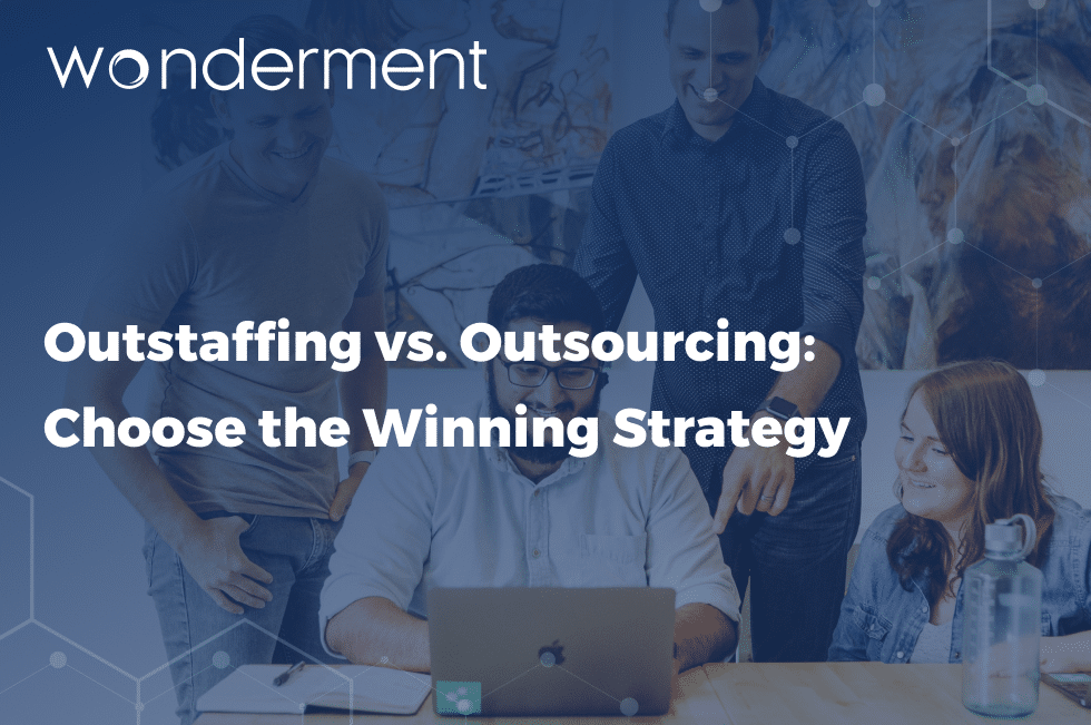 This is an image that presents the title of the article. Outstaffing vs. Outsourcing: Choose the Winning Strategy